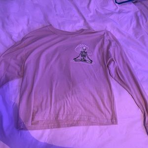 beige long sleeved skeleton/mushroom shirt. small